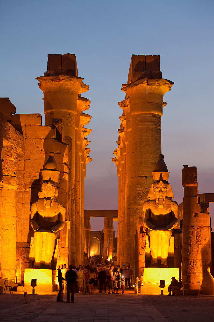 Great court of Ramesses II in the evening light, view into the Colonnade, Luxor Temple, Luxor, Egypt, Africa