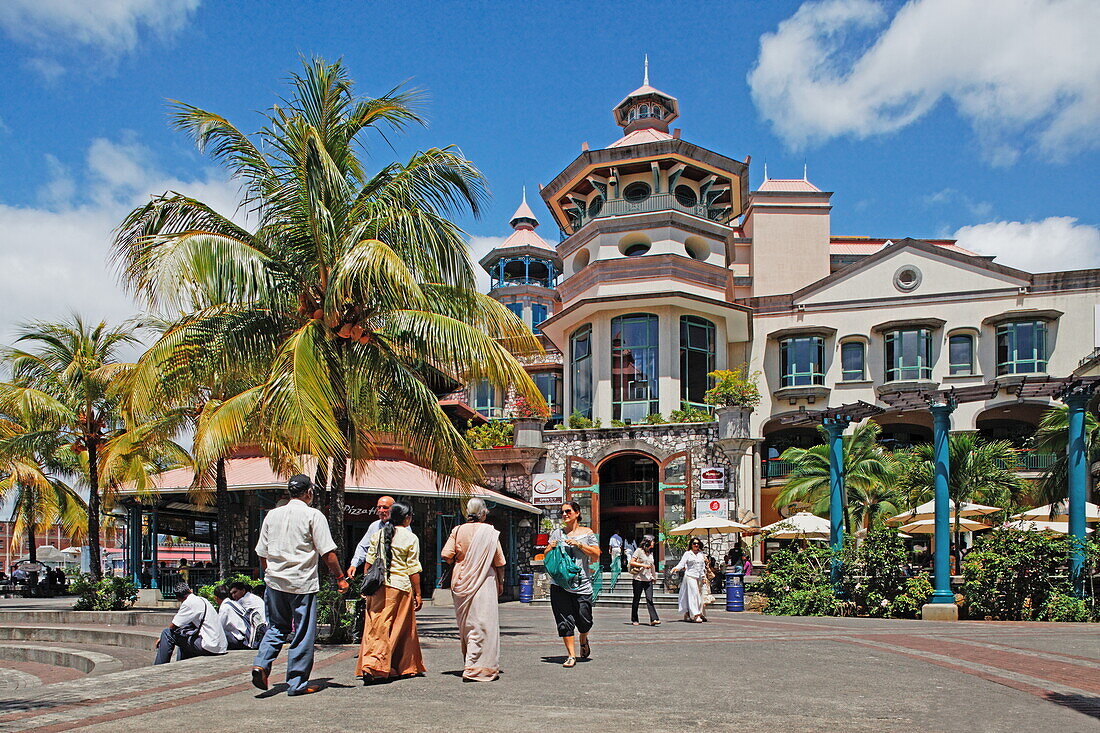 People in front of the Le Caudan Waterfront shopping center, Port Louis, Mauritius, Africa