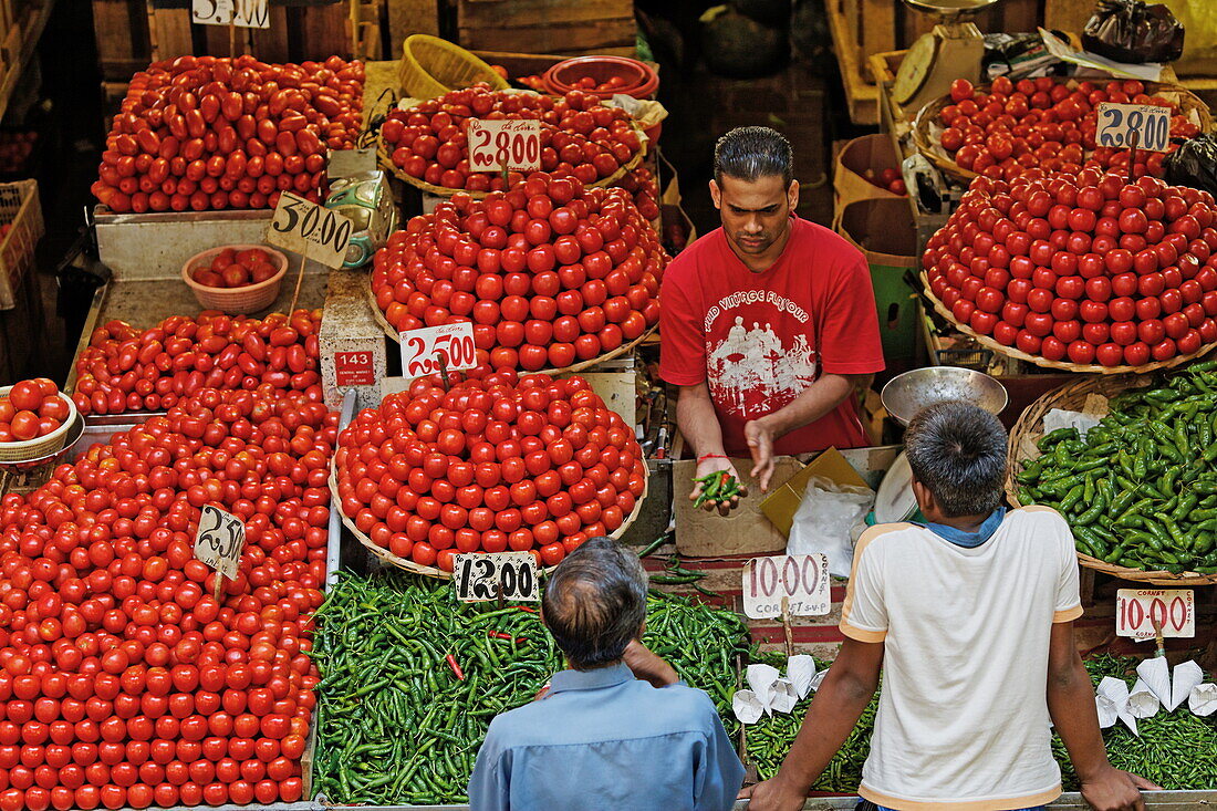 People at stalls in the market hall, Port Louis, Mauritius, Africa