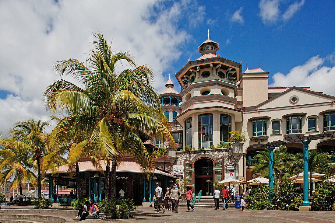 People in front of the Le Caudan Waterfront shopping center, Port Louis, Mauritius, Africa