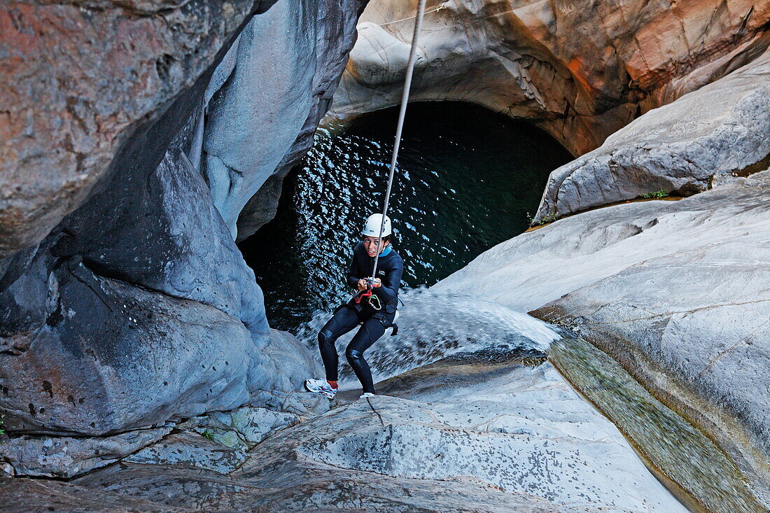 People canyoning at Canyon du Fleur Jaune bei Cilaos, La Reunion, Indian Ocean