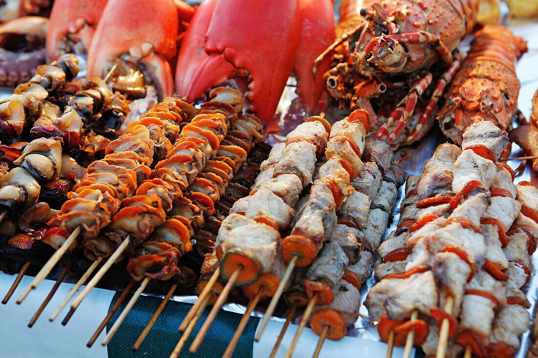 Fish skewers at a stand at the night market, Forodhani Gardens, Stonetown, Zanzibar City, Zanzibar, Tanzania, Africa