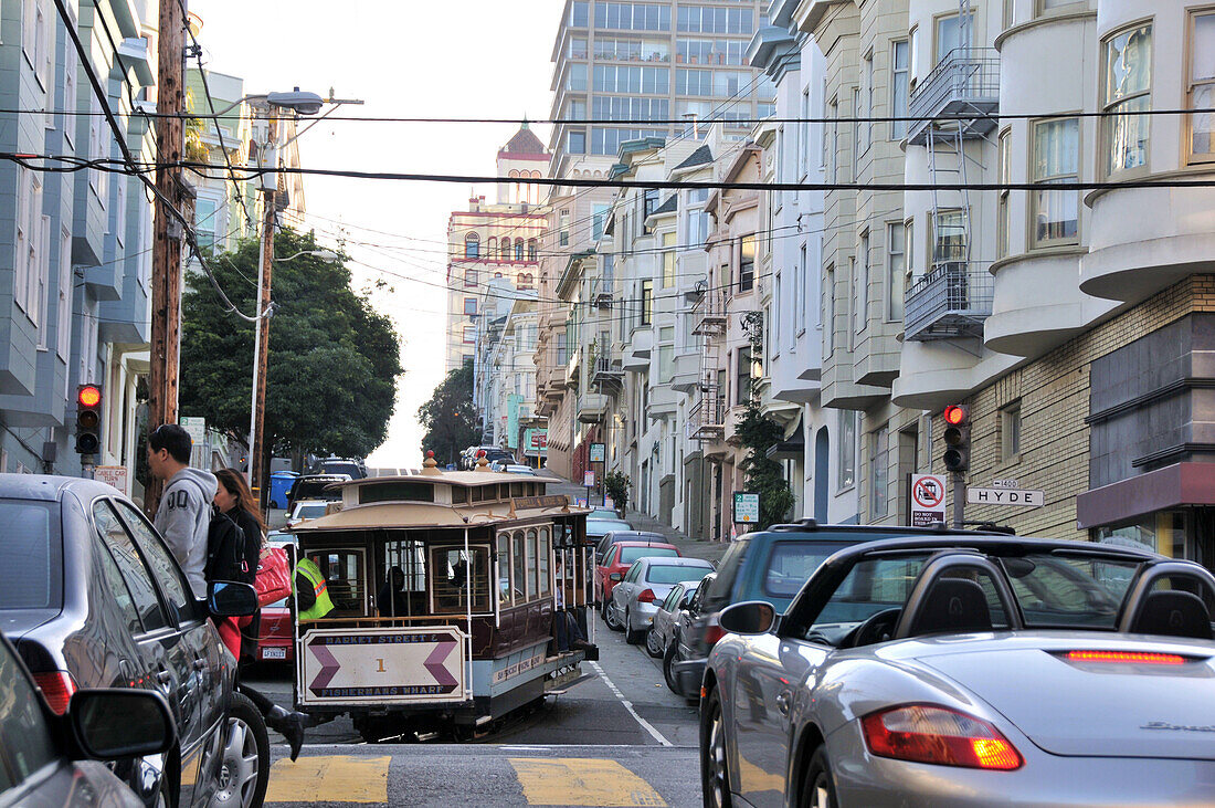 Cable car and cars in a steep street, San Francisco, California, USA, America