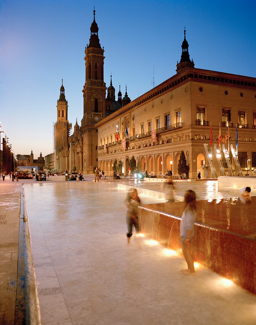 Fountain near Basilica of Our Lady of the Pillar in the evening, Zaragoza, Aragon, Spain