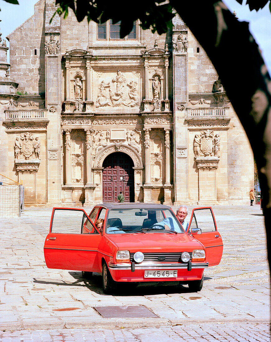 Red Ford in front of the chapel Sacra Capilla del Salvador, Plaza Vasquez de Molina, Úbeda, Andalusia, Spain
