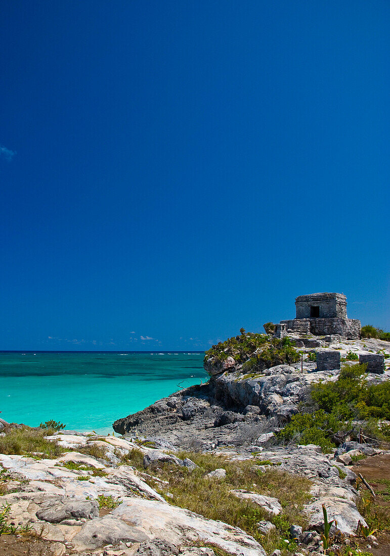 View to the Temple of the Wind and the ocean, Tulum, Quintana Roo, Mexico