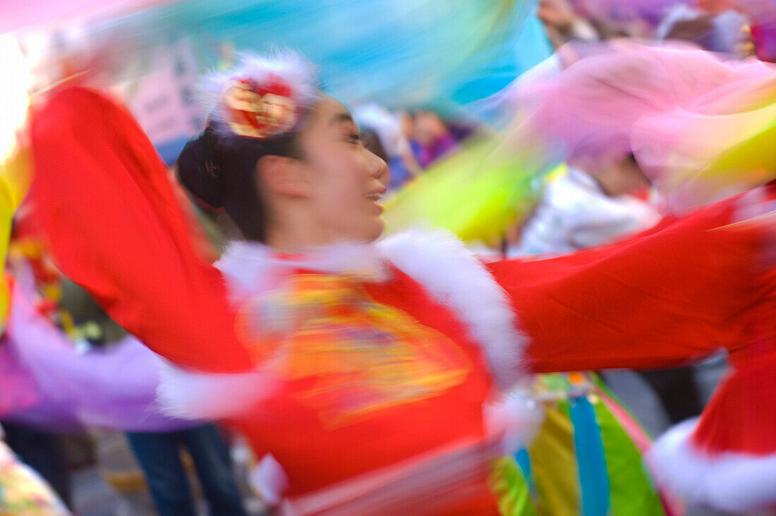 Chinese New Year - dancer in street parade, London, UK - England