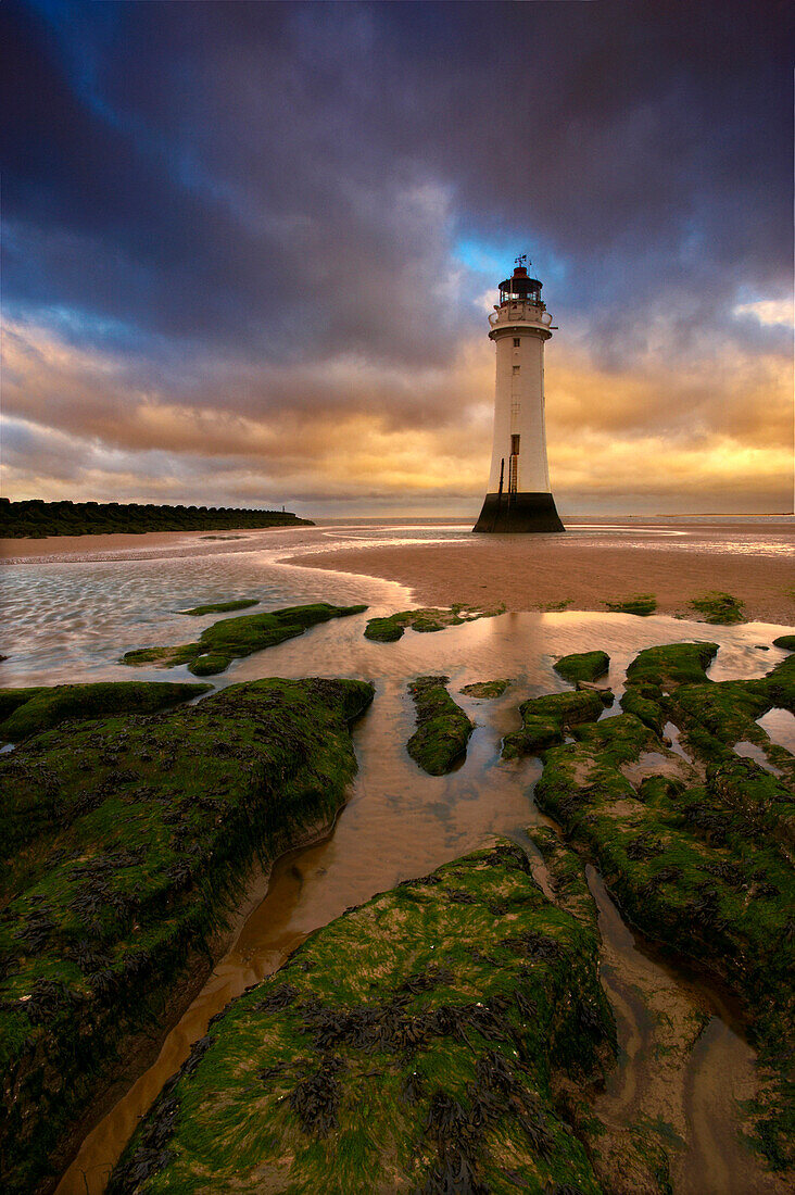 Perch Rock Lighthouse at sunset, New Brighton, Merseyside, UK - England