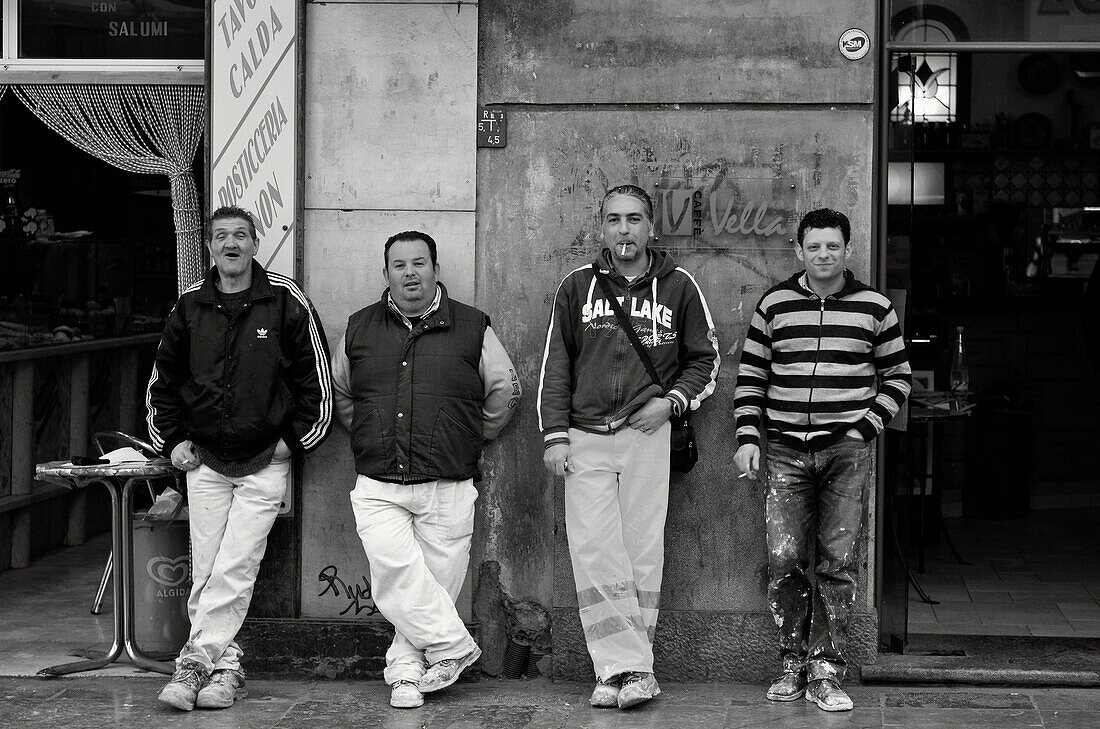 Four workers during the break, Palermo, Sicily, Italy