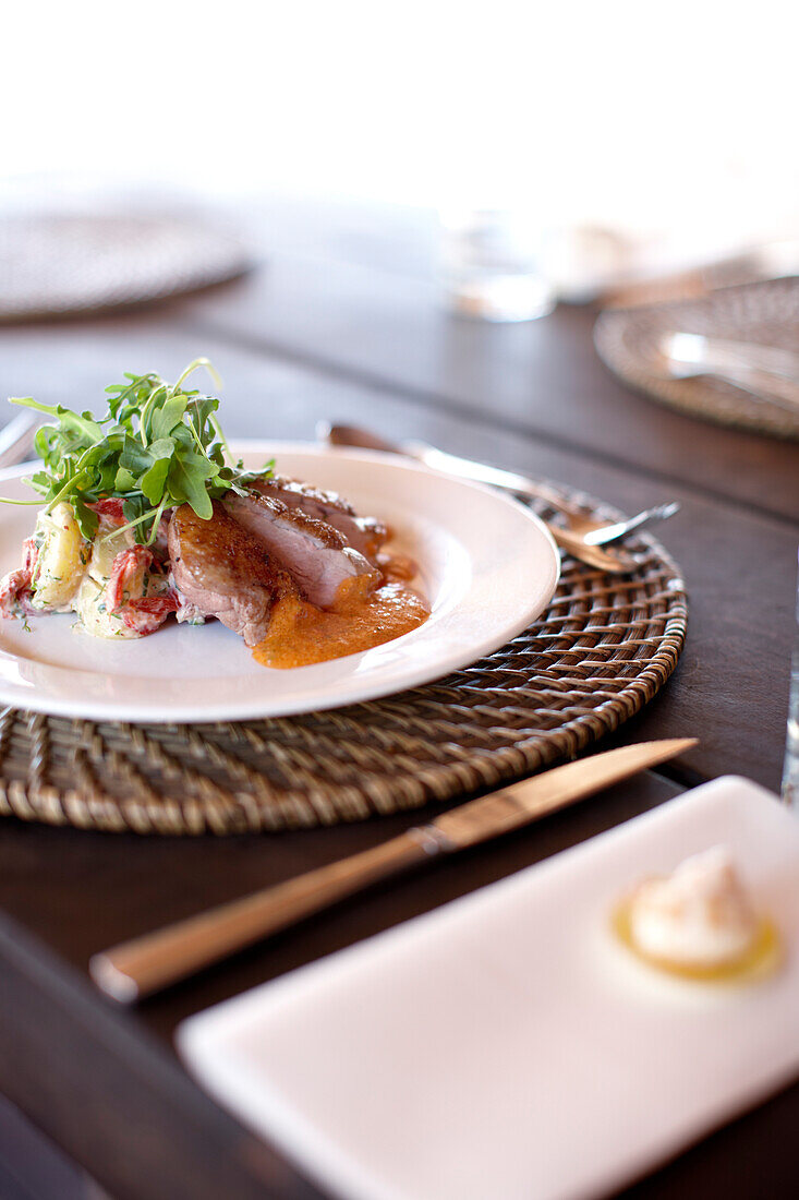 Roast duck with rocket, lunch at the shared restaurant tent, Wilson island Resort, Wilson Island, part of the Capricornia Cays National Park, Great Barrier Reef Marine Park, UNESCO World Heritage Site, Queensland, Australia