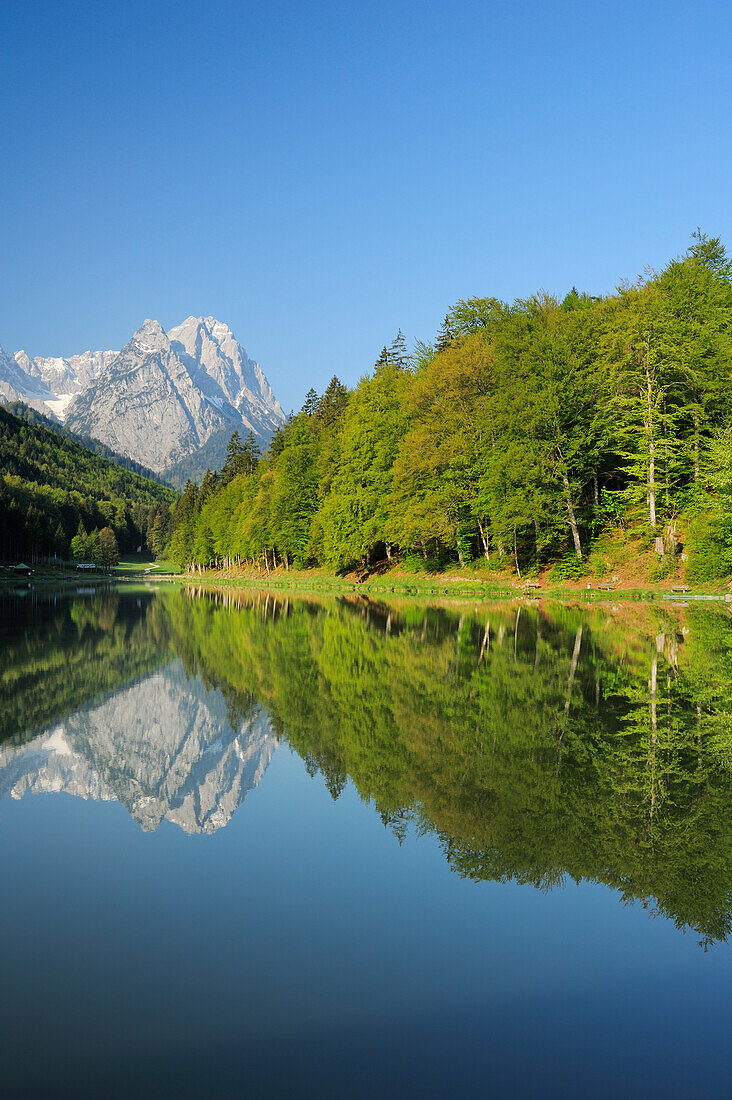 Zugspitze range with Waxenstein reflecting in lake Riessersee, Riessersee, Garmisch-Partenkirchen, Wetterstein range, Werdenfels, Upper Bavaria, Bavaria, Germany, Europe