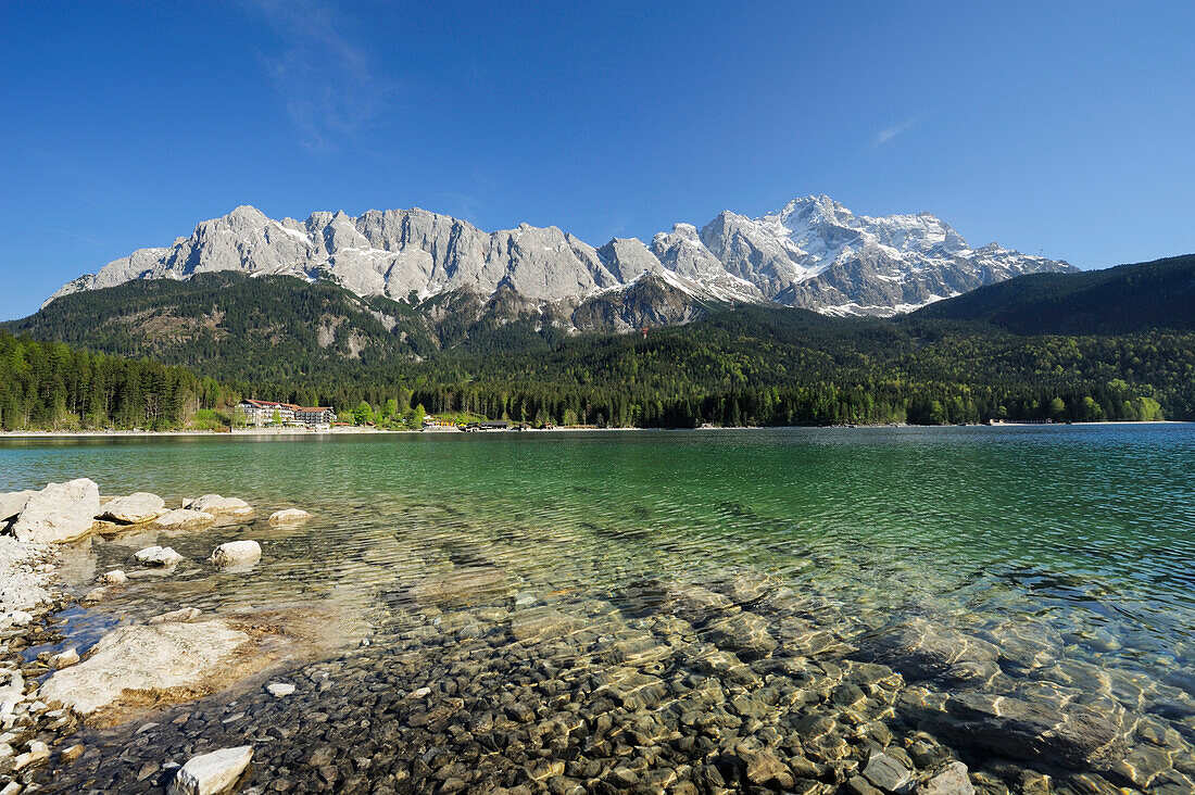 Zugspitze above lake Eibsee in the sunlight, lake Eibsee, Garmisch-Partenkirchen, Wetterstein range, Werdenfels, Upper Bavaria, Bavaria, Germany, Europe