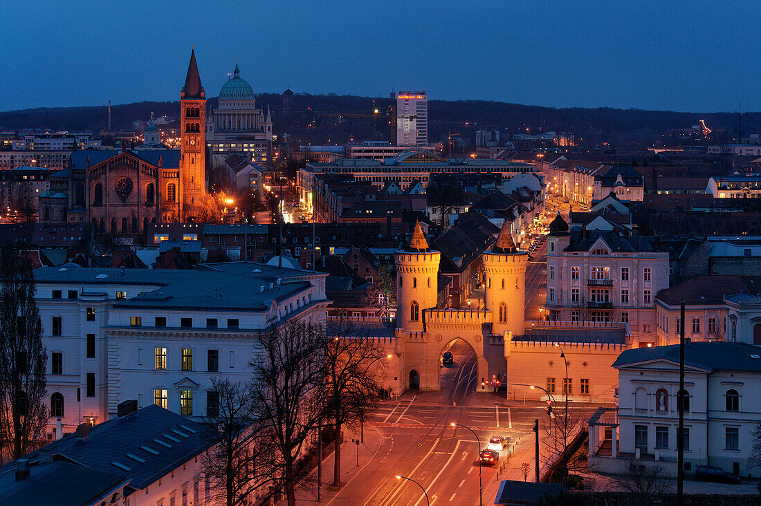 View of Friedrich Ebert Street, Nauener Gate, St. Peter and Paul Church and St. Nicholas Church at night, Potsdam, Brandenburg, Germany, Europe