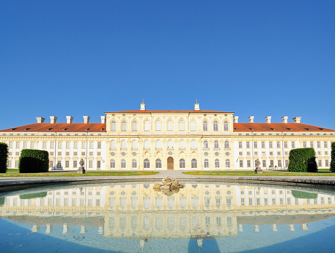 Castle Schloss Schleissheim reflecting in water basin, Neues Schloss, Schleissheim, Munich, Upper Bavaria, Bavaria, Germany, Europe