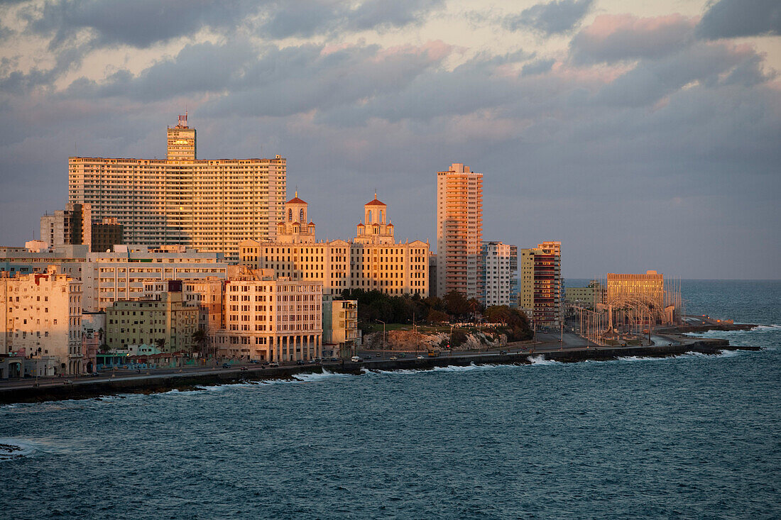Buildings, Hotel Nacional in the center and Malecon sea drive at sunrise, City of Havana, Havana, Cuba