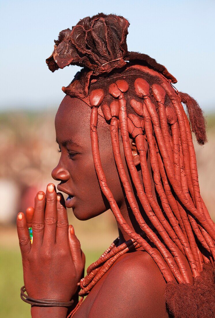 Himba woman with the typical hairstyle, Kaokoland, Namibia