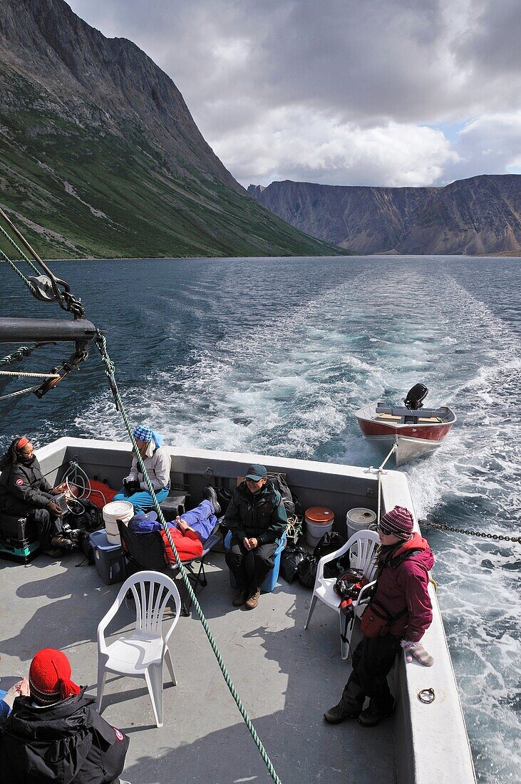group of tourists on a boat at North Arm of Saglek Fjord, Torngat Mountains National Park, Newfoundland and Labrador, Canada
