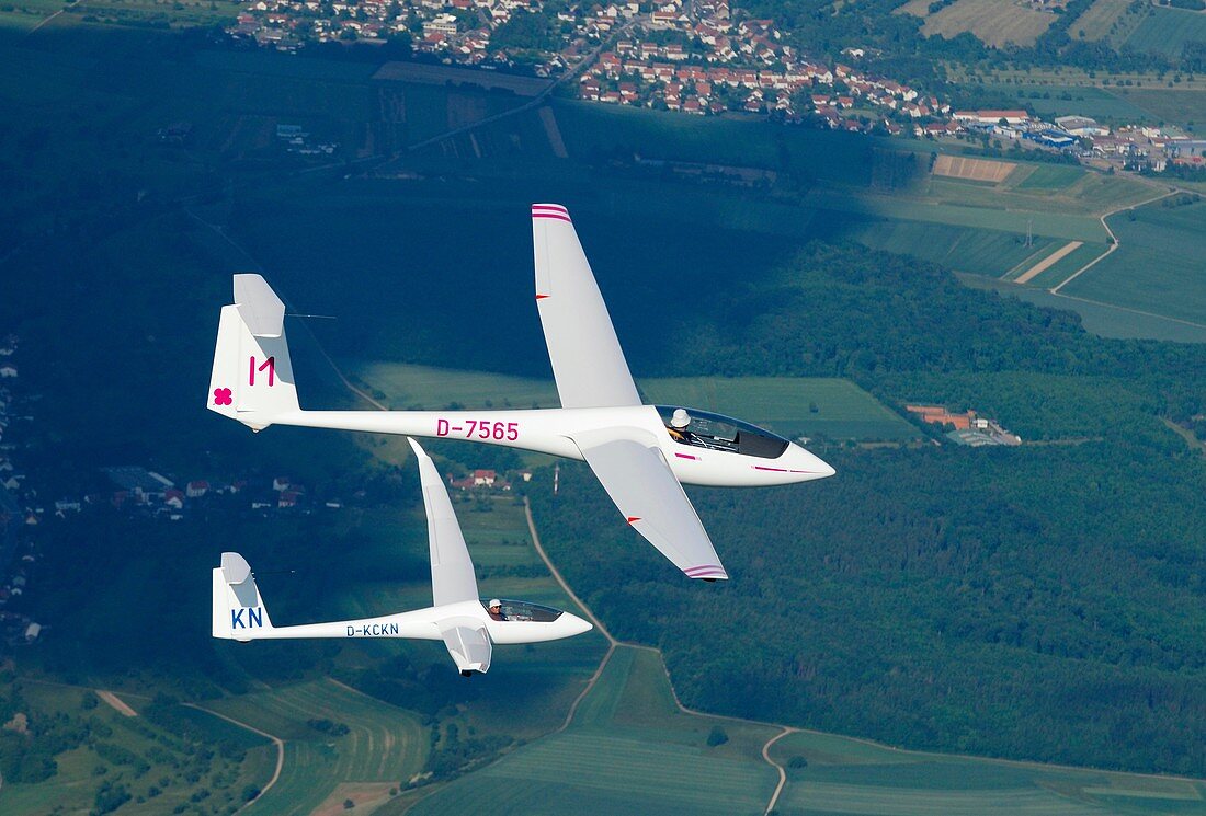 Two Single seat gliders Asw 19b and Discus 2CT in flight over french Lorraine countryside - France
