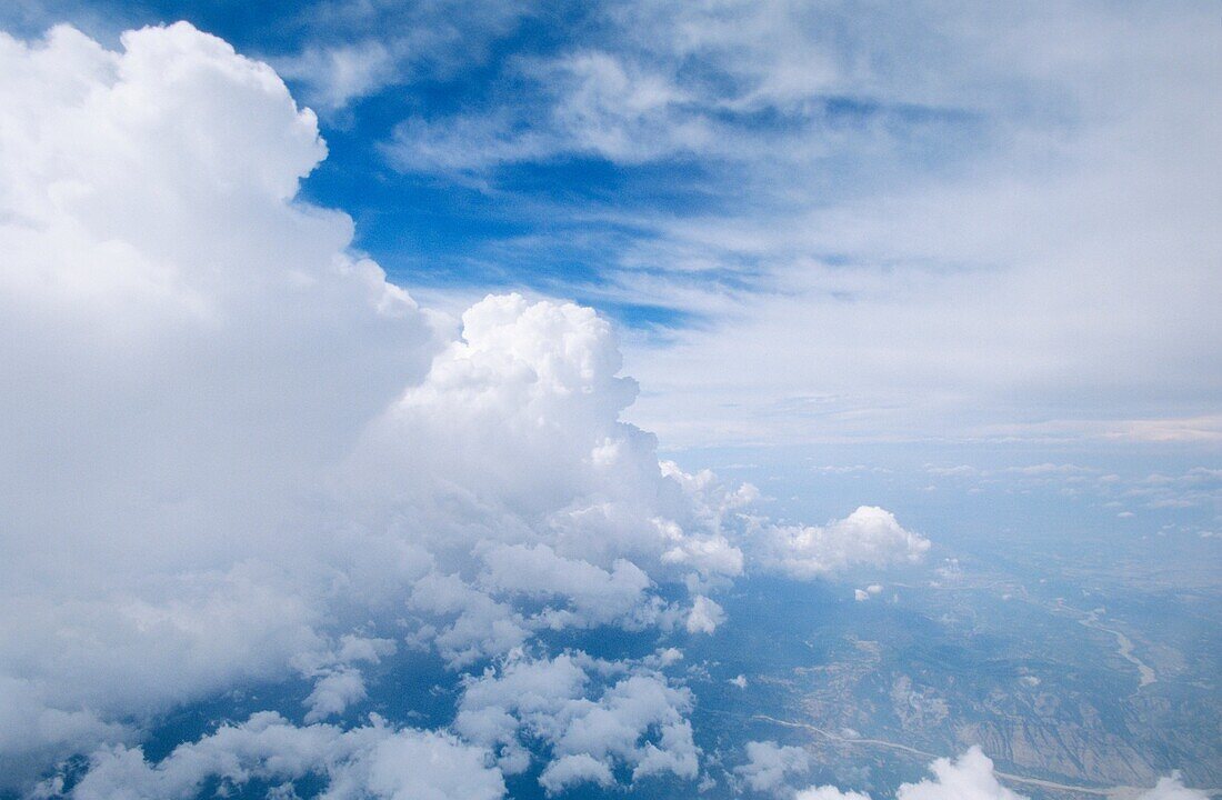Above, Aerial, Air, Atmosphere, Atmospheric, Big, Blue, Cloud, Clouded, Clouds, Cloudscape, Cloudy, Congestus, Cumulonimbus, Cumulus, Flight, Flying, Formation, Front, Huge, Land, Landscape, Massive, Mid-air, Mood, Over, Overview, Phenomen, Side view, Sky