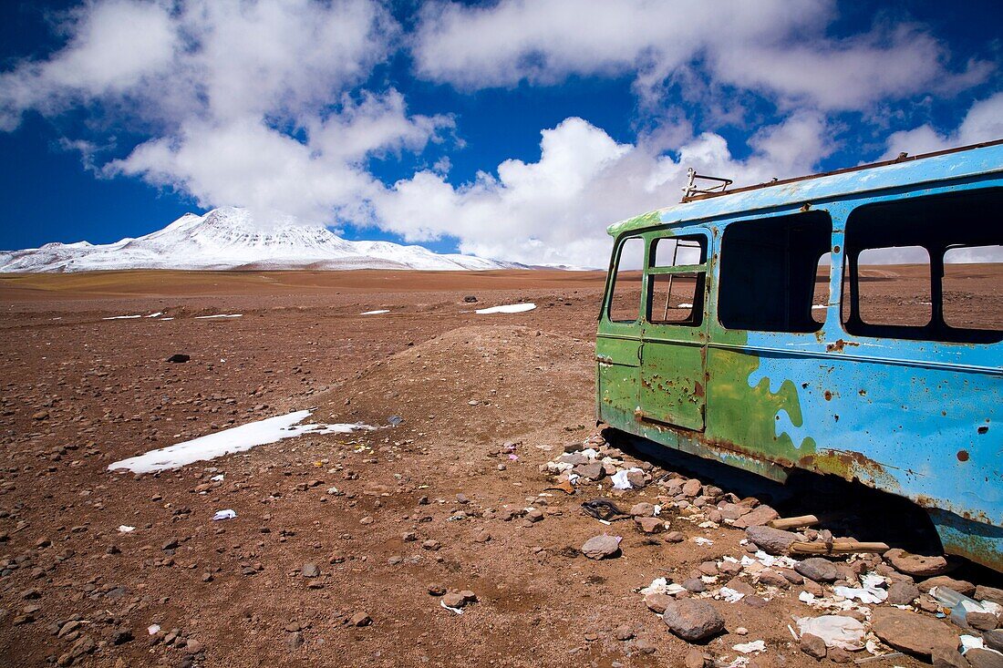 Bolivia, Southern Altiplano, Portezuelo del Cajon Abandonded bus shell rustin near the Chilean Border