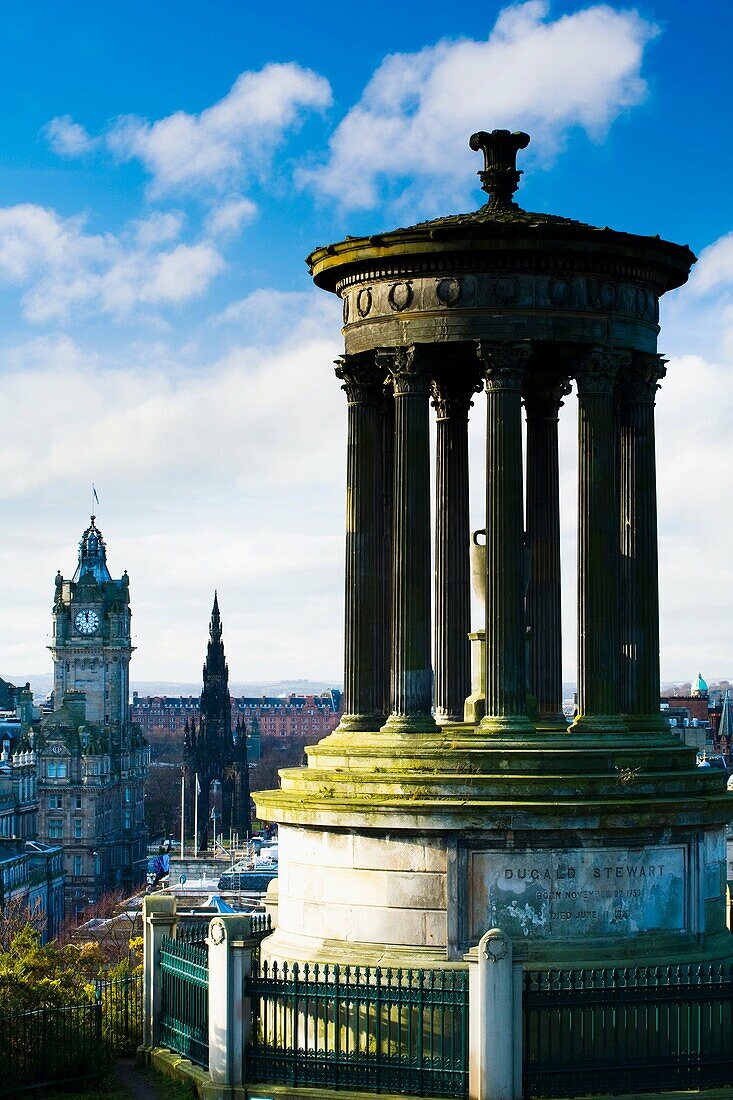 Scotland, Edinburgh, Calton Hill The Dugald Stewart Monument on Calton Hill, looking towards the Castle and Old Town of Edinburgh