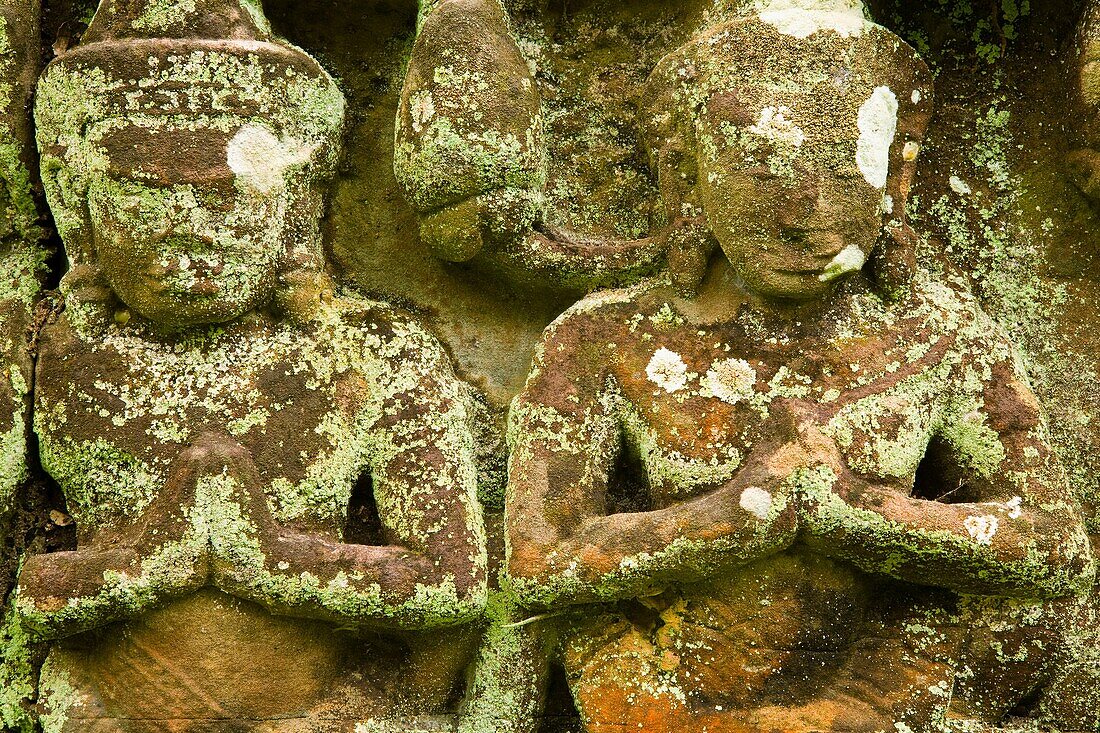 Cambodia, Angkor, Angkor Wat Close up details of Angkor relief art on the walls of the dramatic remains of Angkor Wat