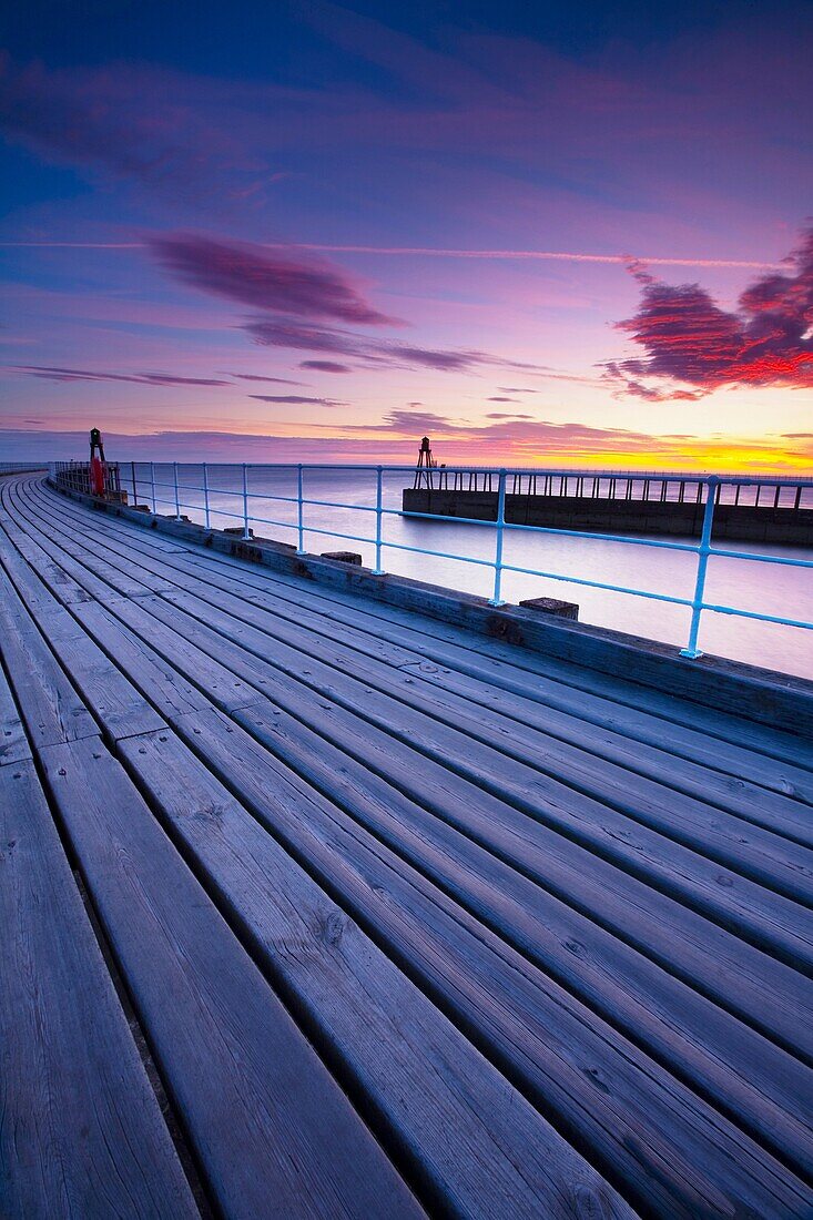 England, North Yorkshire, Whitby The entrance piers of Whitby Harbour at dawn