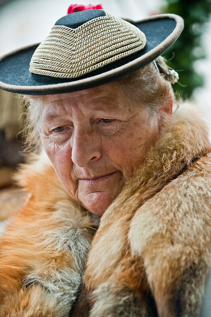 Woman wearing traditional costumes, festival of Leonhardiritt, Benediktbeuren, Bavaria, Germany