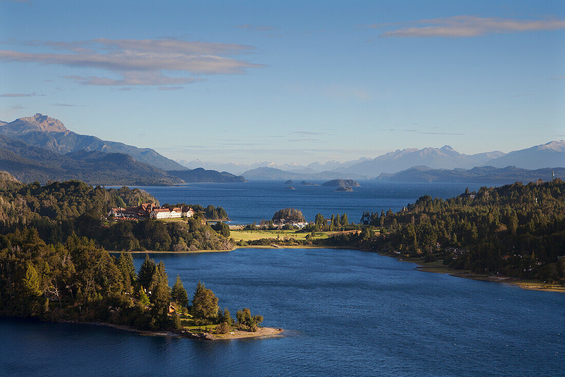 Morning light at Lago Moreno, view to an hotel and the Lago Nahuel Huapi, near San Carlos de Bariloche, Rio Negro, Patagonia, Argentina