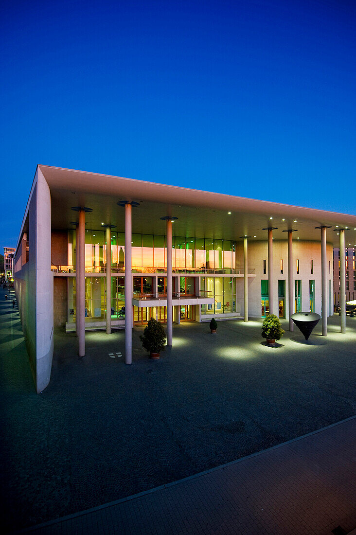 Illuminated concert hall in the evening, Freiburg im Breisgau, Baden-Wuerttemberg, Germany, Europe