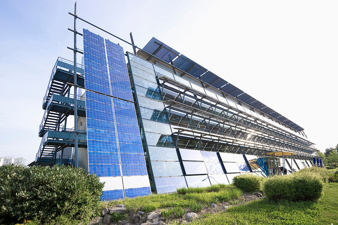 Factory building with solar installation, Freiburg im Breisgau, Baden-Wuerttemberg, Germany, Europe