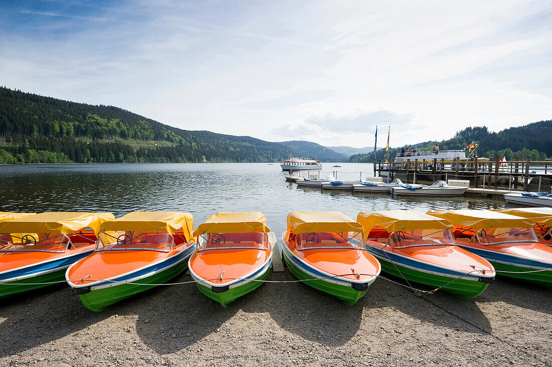 Boats on shore of lake Titisee, Black Forest, Baden-Wuerttemberg, Germany, Europe