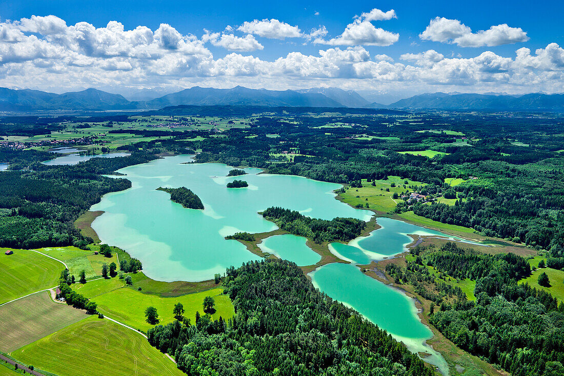Aerial view over lakes Osterseen onto Jochberg, Herzogstand, Heimgarten, Ester mountains and Wetterstein mountains, Upper Bavaria, Germany, Europe