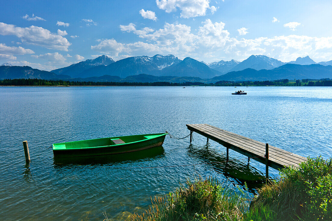 Boat and jetty at lake Hopfensee, East Allgaeu, Germany, Europe