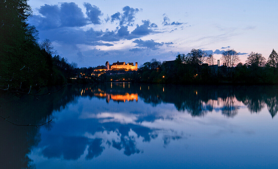 Illuminated Fuessen Castle at the river Lech in the evening, East Allgaeu, Germany, Europe