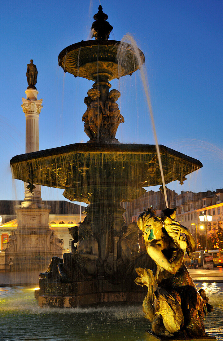 Fountain on Rossio square in the evening, Lisbon, Portugal, Europe