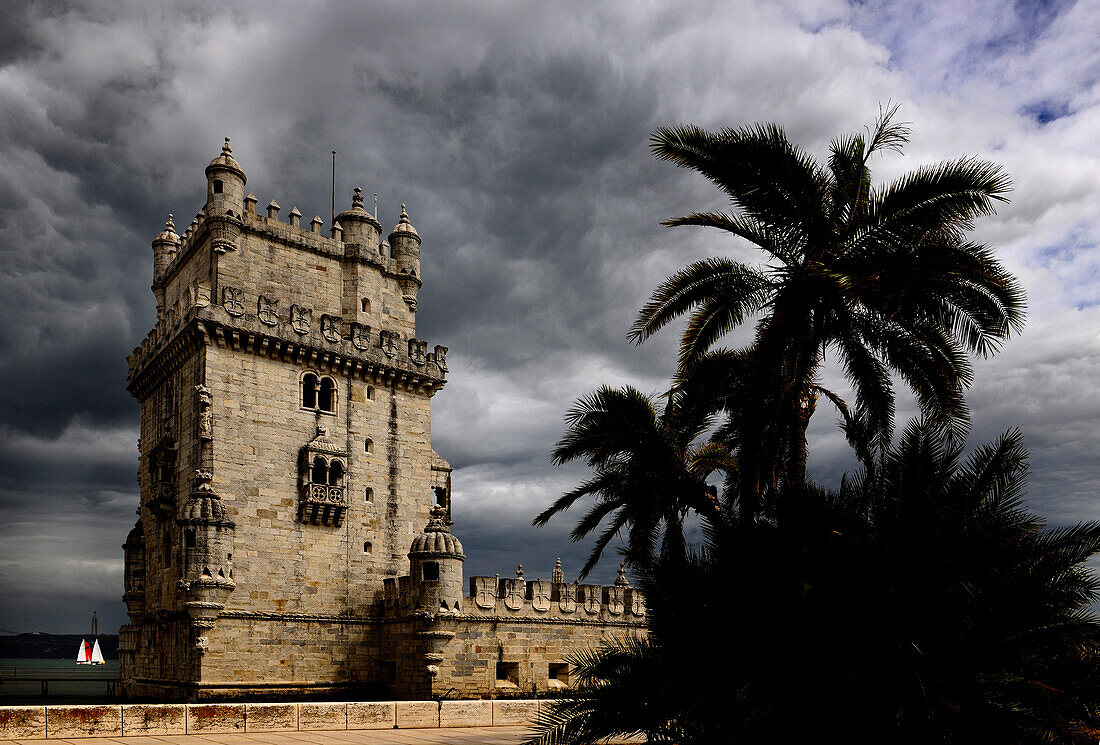 Torre de Belem, historical tower under clouded sky, Belem, Lisbon, Portugal, Europe