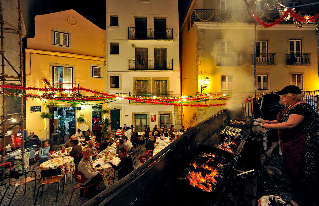 Street festival at Alfama quarter in the evening, Lisbon, Portugal, Europe