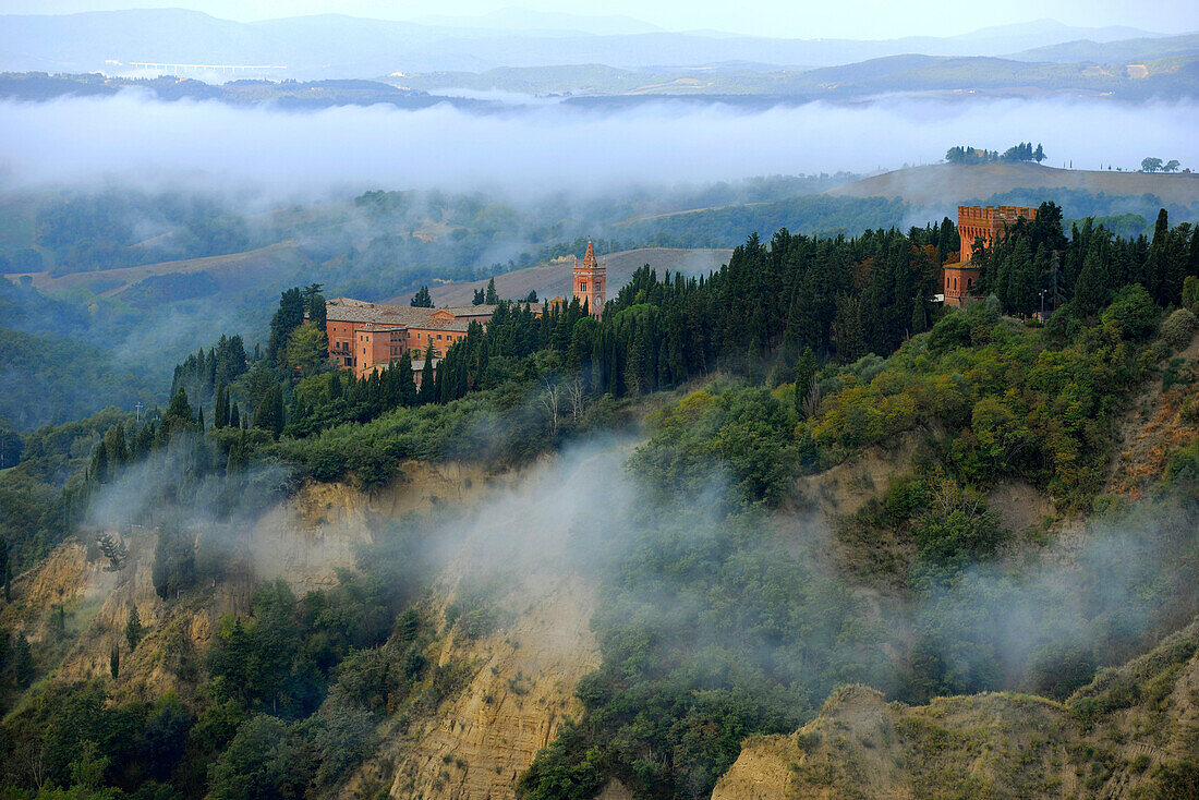 View of abbey Abbazia di Monte Oliveto Maggiore, Crete, Tuscany, Italy, Europe