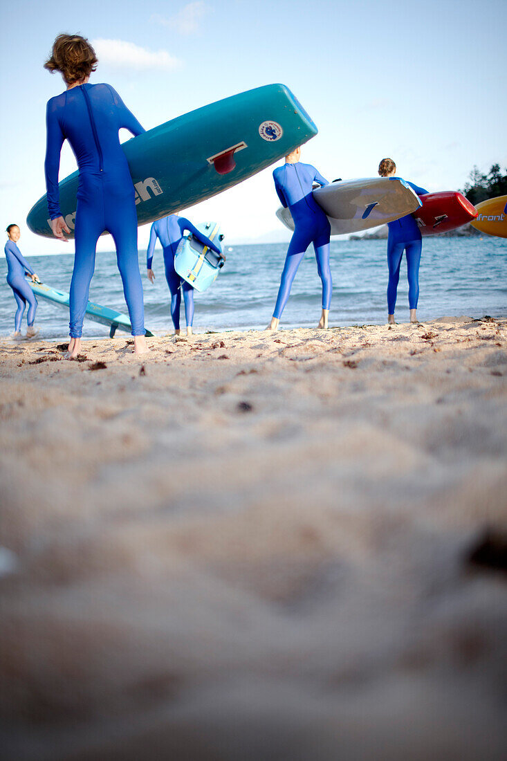 Teen members of the Arcadian Surf Life Saving Club at Alma Bay, eastcoast of Magnetic island, Great Barrier Reef Marine Park, UNESCO World Heritage Site, Queensland, Australia