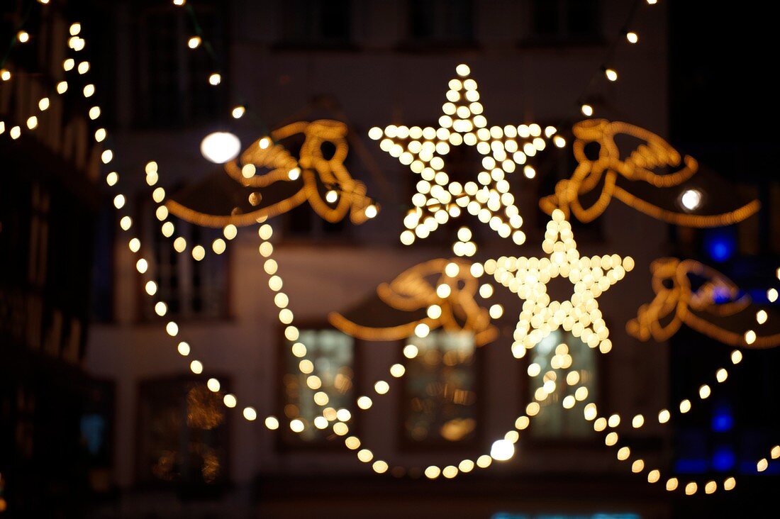 festive street Christmas lights with angel and stars