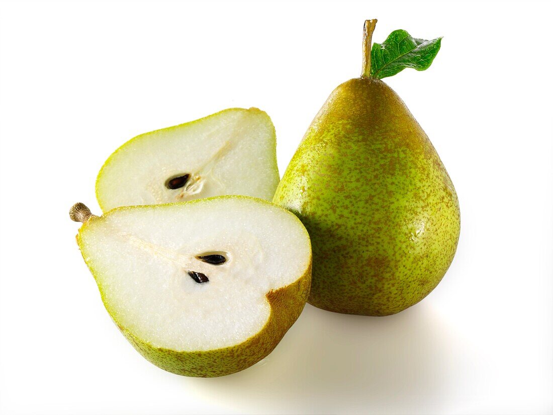 Fresh comice pears whole and cut