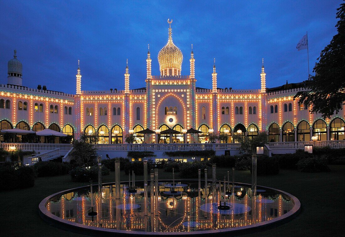 Denmark, Copenhagen, Tivoli amusement park at night