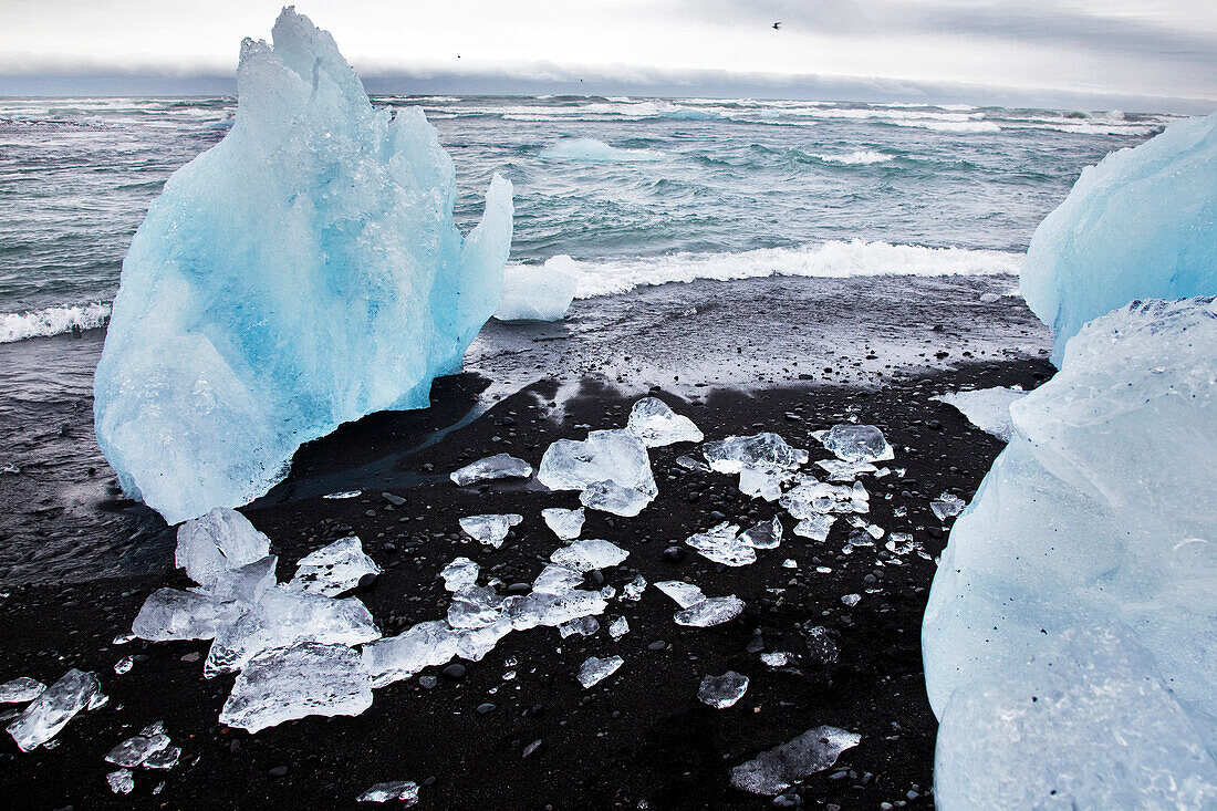 Black Sand Beach and Icebergs on Lake Jokulsarlon, An Extension of the Vatnajokull Glacier Or Glacier of Lakes, the Largest Icecap in Iceland, Possibly Even Europe