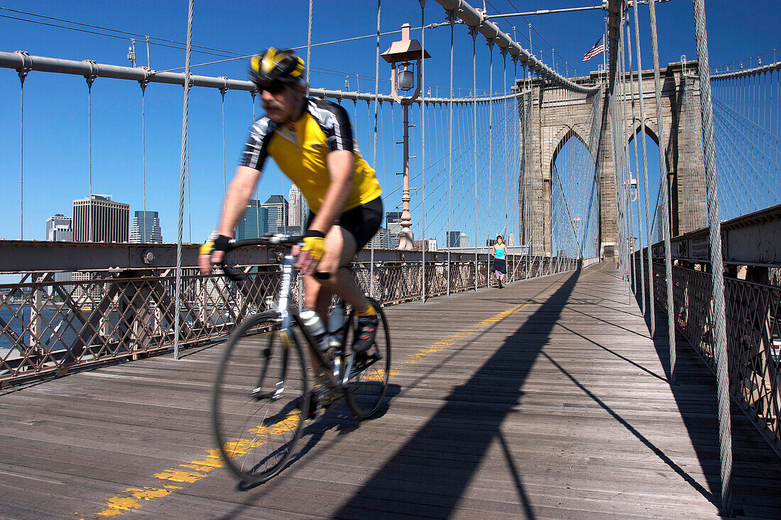 Cyclist Crossing the Brooklyn Bridge, Bicycle, Cycling, Leisure, East River, Manhattan, New York City, United States of America, Usa