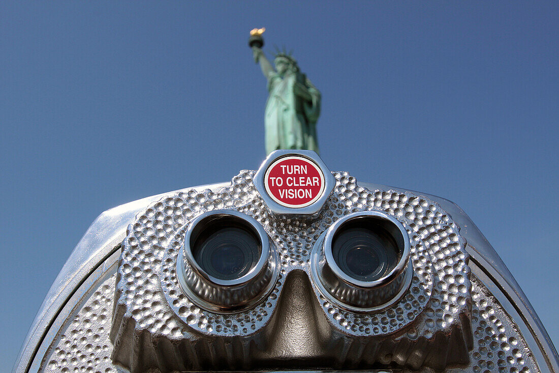 Close-Up of Binoculars Aimed at the Statue of Liberty, Liberty Island, Port of New York City, New York State, United States
