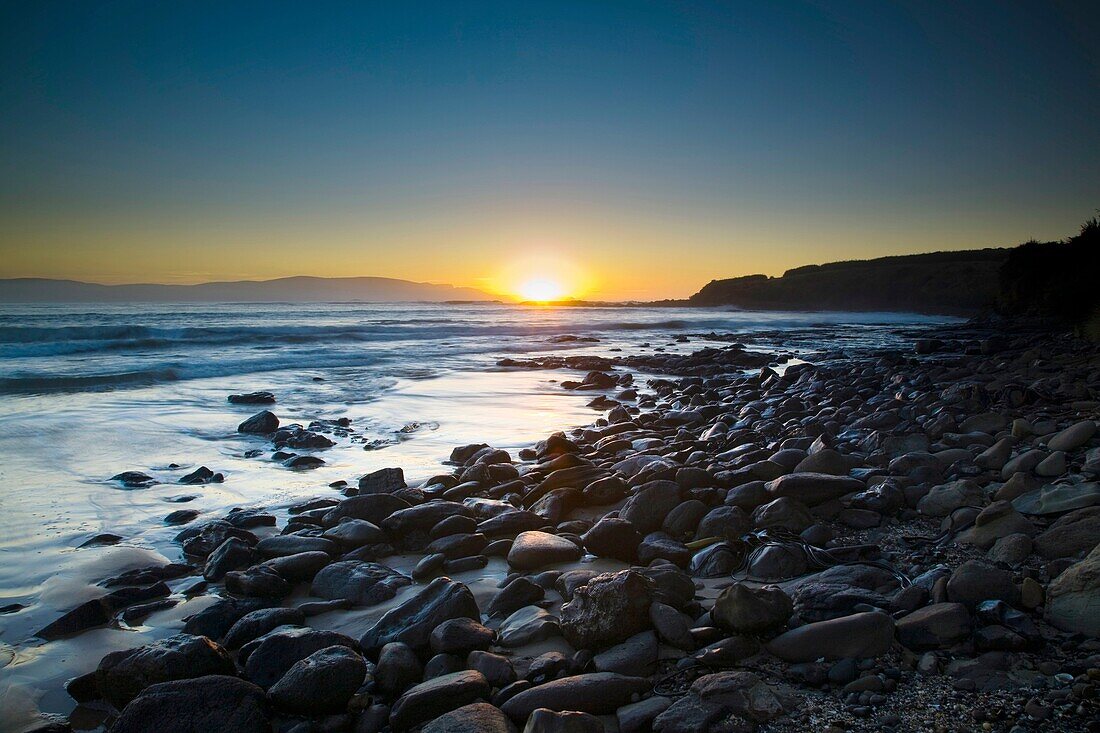 New Zealand, Southland, The Catlins Dawn looking towards the Brothers Point, viewed from Porpoise Bay