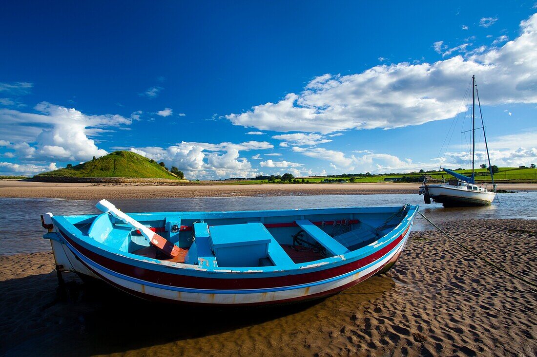 England, Northumberland, Alnmouth Boats on the tidal Aln Estuary at Alnmouth The hill in the distance is known as Church Hill