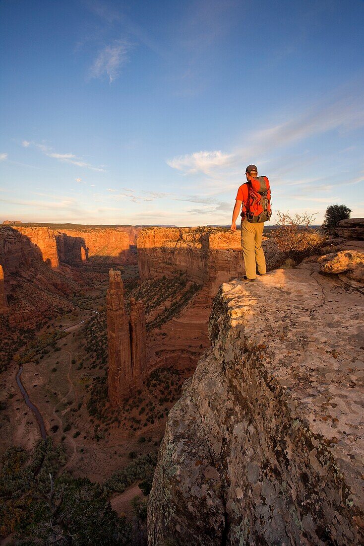 Hiker at the Spider rock Viewpoint in the Canyon de Chelly, Arizona