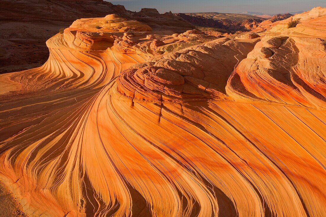 Sandstone formation in Coyote Buttes notrh area illuminated by reflected morning light deep in one southwestern canyon